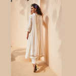 Off-white kurta and pants set with prints