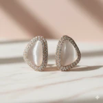 Side angle of Cubic Zirconia Rose Gold Curved Statement Earrings for Girls