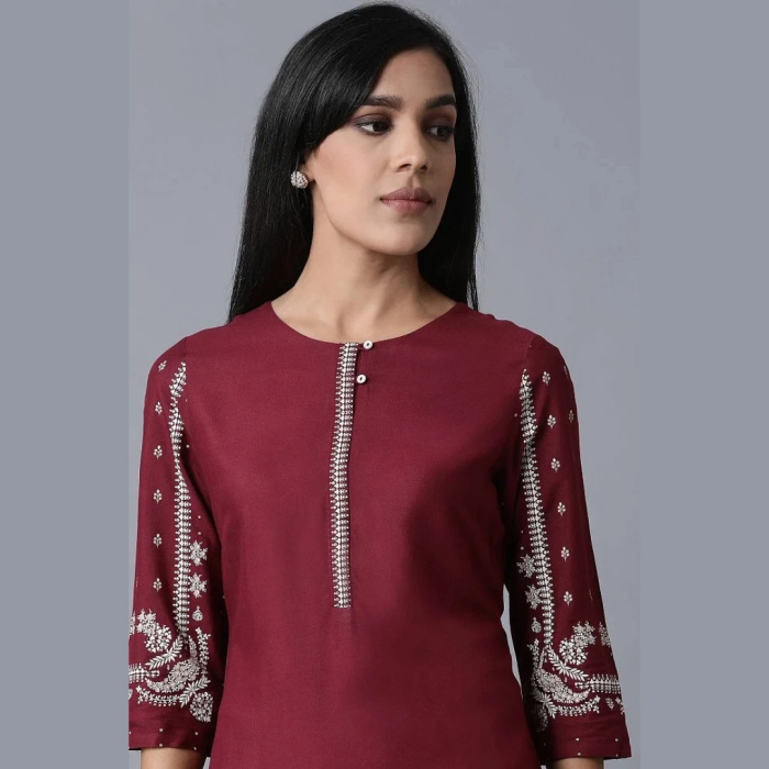 Closeup of Maroon Straight Kurta with Cream Pants