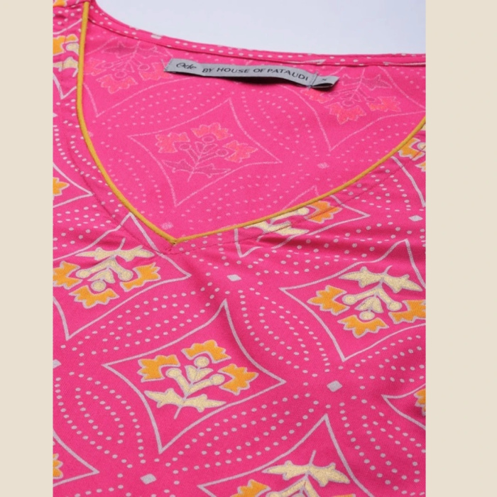 Closeup of Pink Printed Kurta with White Pants