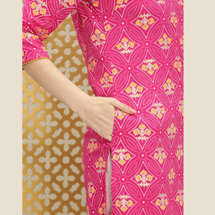 Closeup of Pink Printed Kurta with White Pants